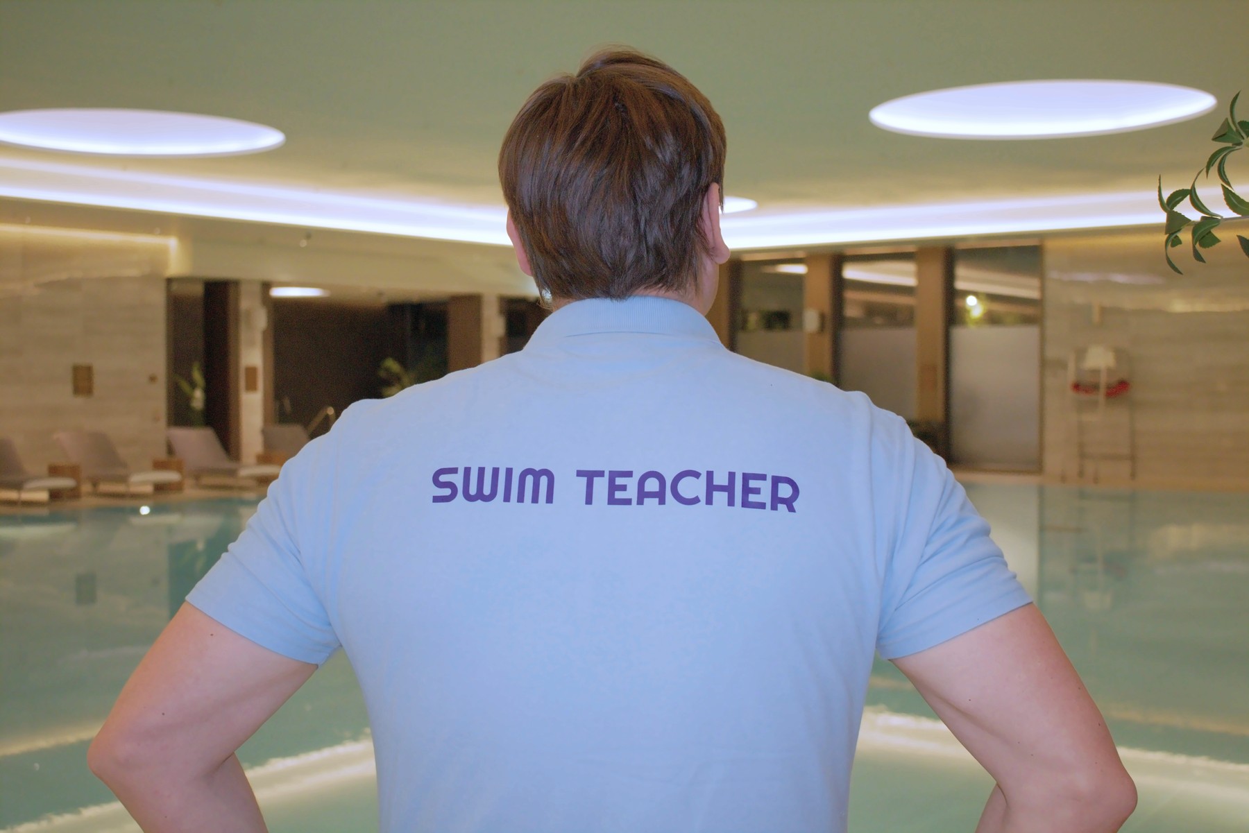 Hristo Grahovski teaching in a residential development pool