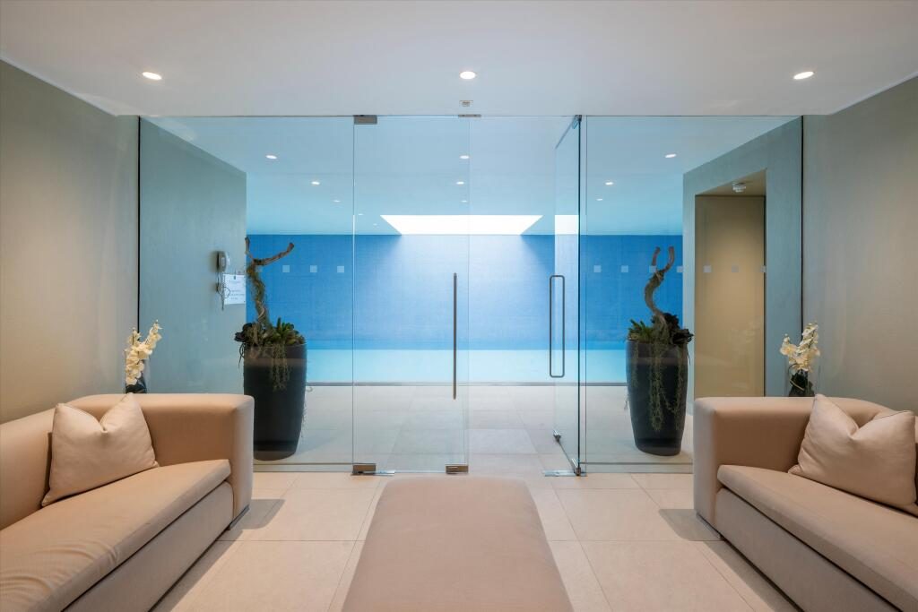 The residents' lounge and pool at Academy Gardens, Kensington