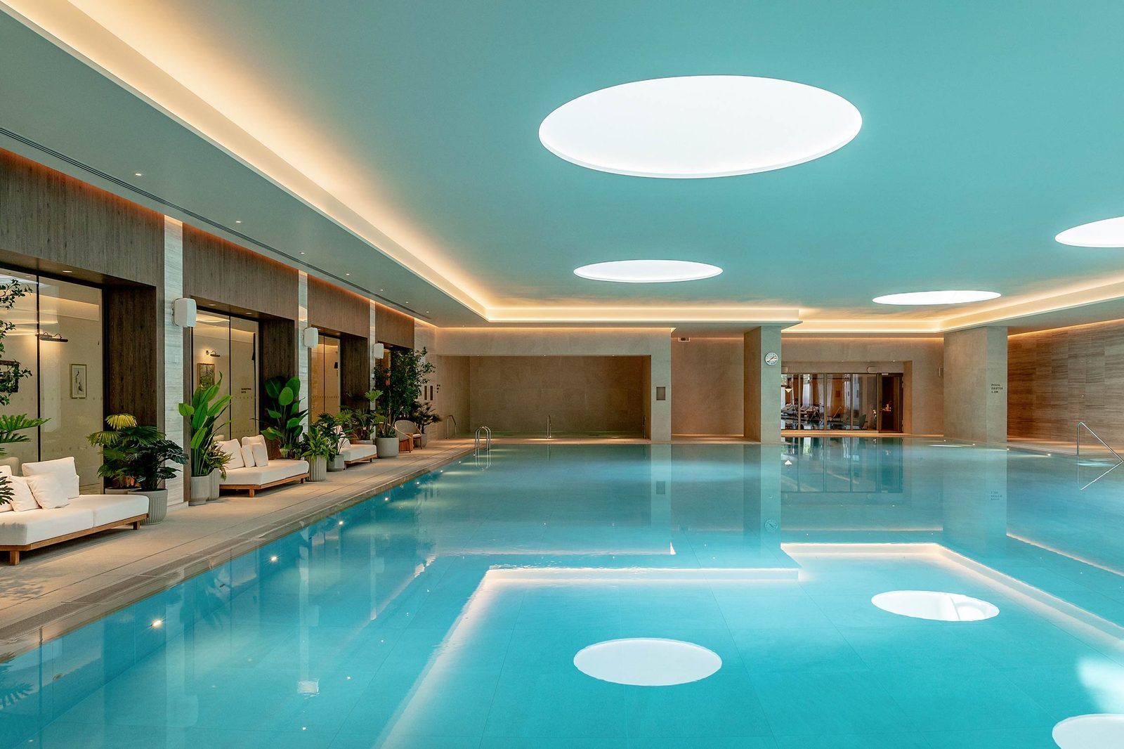 The 30-metre residents' pool at Thames City, Nine Elms, beneath round skylights